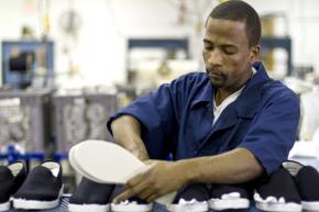 An inmate at work in a prison labor shop