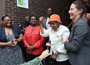 Mary Lee Ward emerges from a New York City courtroom after learning her eviction was halted