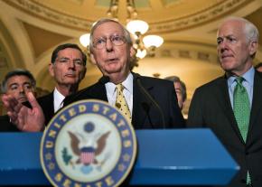 Senate Majority Leader Mitch McConnell speaks with reporters